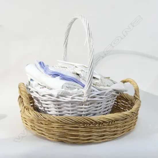 2 LG CANE BASKETS, 1 WITH OLD LINEN & EMBROIDERED. ELEPHANT TEA COSY