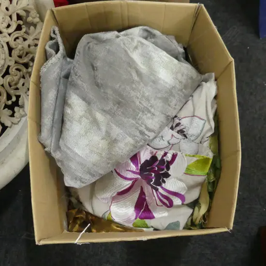 A SELECTION OF DESIGNER UPHOLSTERY FABRIC PIECES AND OFF CUTS