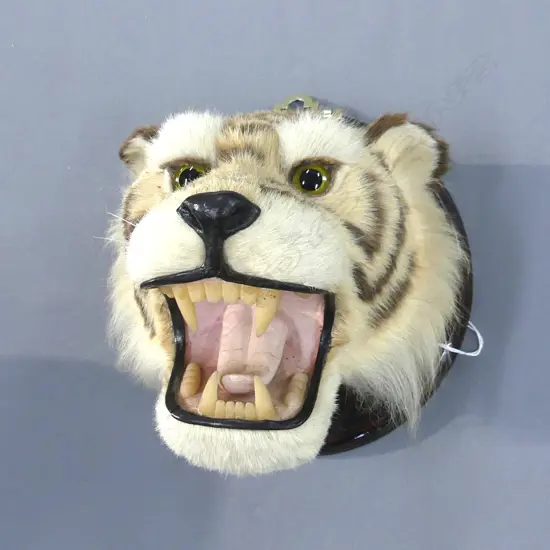 FAKE TIGER HEAD ON WOODEN BASE