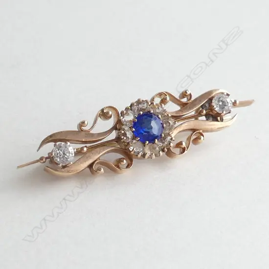 9CT ROSE GOLD BAR BROOCH WITH BLUE & WHITE STONES 2.9GMS