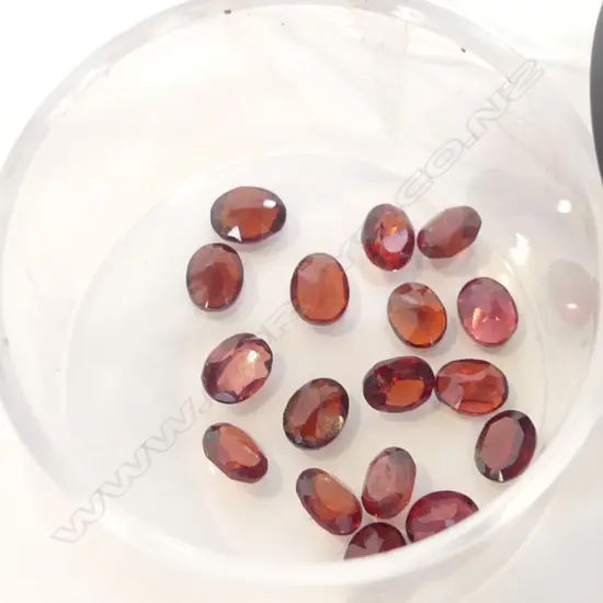 17 GARNET (?) CUT GEMSTONES  