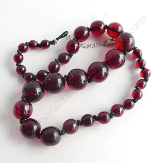 RED LUCITE KNOTTED BEAD NECKLACE - STG SILVER CATCH 