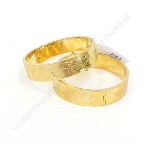 TWO VINTAGE GOLD PLATED HINGED BRACELETS 