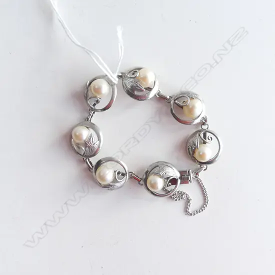 STG SILVER BRACELET SET WITH 7 PEARLS 22.53 GMS