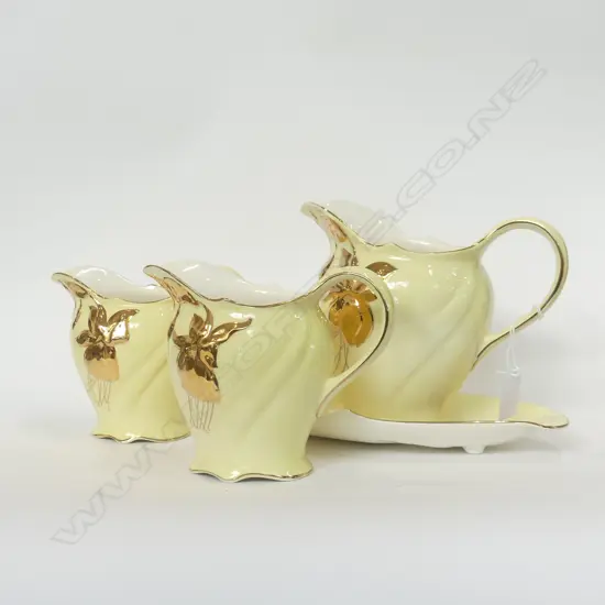 ROYAL WINTON 3 GRADUATED JUGS & DISH - YELLOW WITH GOLD EMBOSSED FLOWERS 