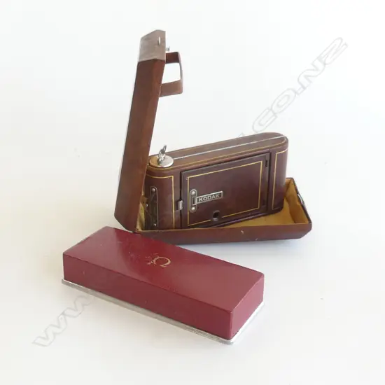 OLD KODAK BELLOWS CAMERA IN BOX AND AN OLD OMEGA WATCH BOX 