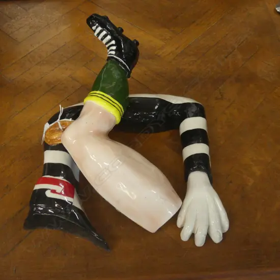 2 STUDIO POTTERY WALL ARTWORKS; AUSSIE RUGBY LEG & B/W STRIPED ARM w. MAORI FLAG W.260mm