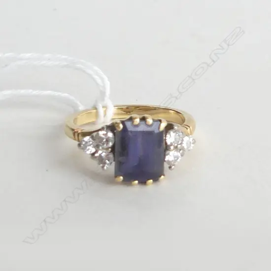 18CT ? GOLD RING WTH IOLITE? STONE & DIAMONDS 4.28GMS STONE IS SCRATCHED