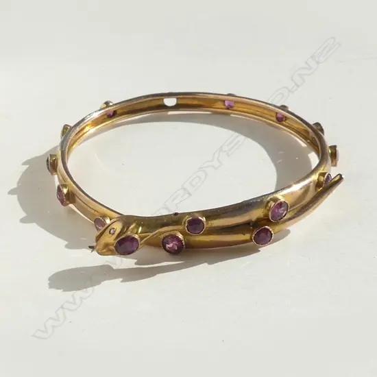 9CT GOLD FILLED (PLATED) SNAKE BANGLE W PURPLE STONES 1 MISSING. Pearl eyes
