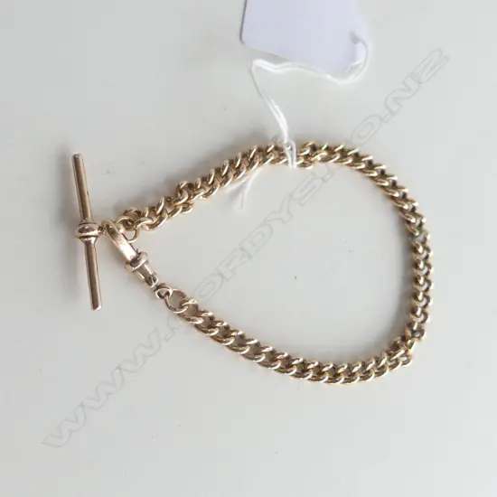 9CT GOLD CURB CHAIN BRACELET WITH FOB 22.43GMS