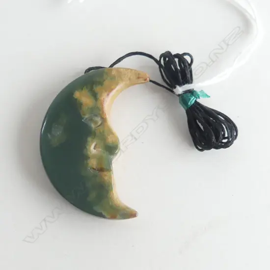 NZ POUNAMU (GREENSTONE) CRESCENT MOON SHAPE PENDANT (L50MM) ON BLACK WAXED ADJUSTABLE CORD