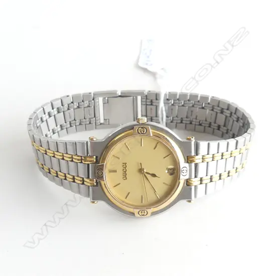 MENS GUCCI (?) WATCH, NOT GOING