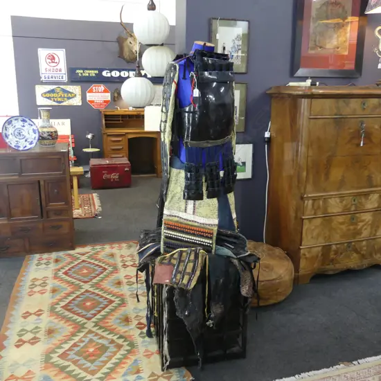 A yoroi is a cavalry armour worn by samurai comprising in its basic form a dō (cuirass) with kusazuri (multipart skirt pendant)