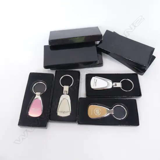 8 GM LICENSED COLOUR TEARDROP CAR KEY RINGS; CORVETTE, CADIALLAC, CHRYSLER ETC.. ALL NEW IN BOXES