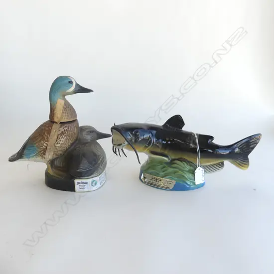 2 JIM BEAM CERAMIC DECANTERS; CATFISH (L 340MM) & PR DUCKS (H. 245MM)