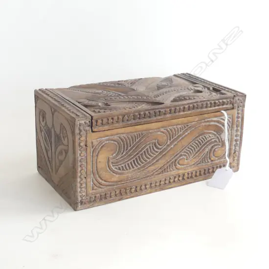 CARVED WOODEN MAORI LIDDED BOX, L. 237MM