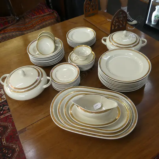HUTSCHENREUTHER DINNER SERVICE ALMOST 8 PLACE SETTING (1 cup faulted)