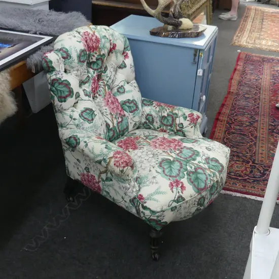 ANTIQUE ENGLISH BEDROOM CHAIR IN FLORAL UPHOLSTERY; EBONISED LEGS c.1870
