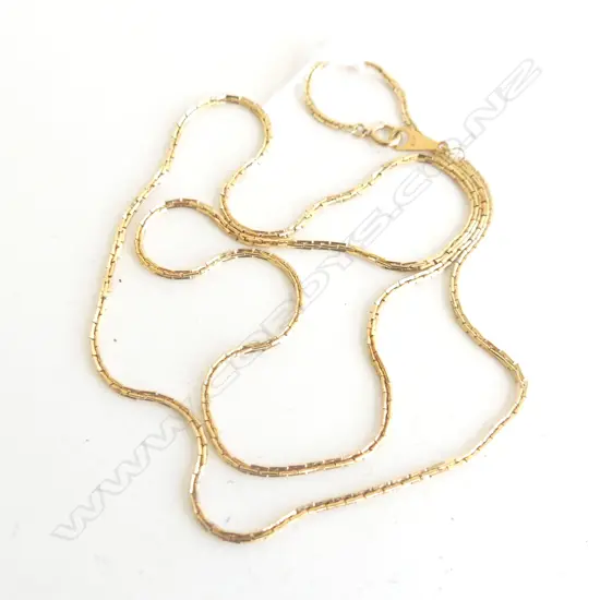 18 CT GOLD NECKLACE 9.4 GRAMS  60CM