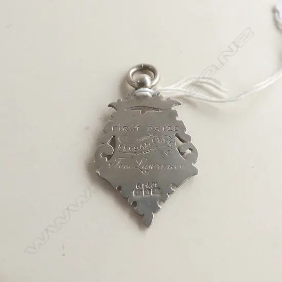 DEC 1899 SILVER FOB ENGRAVED 'FIRST PRIZE FLORAL FETE TOM LAWRENCE' 