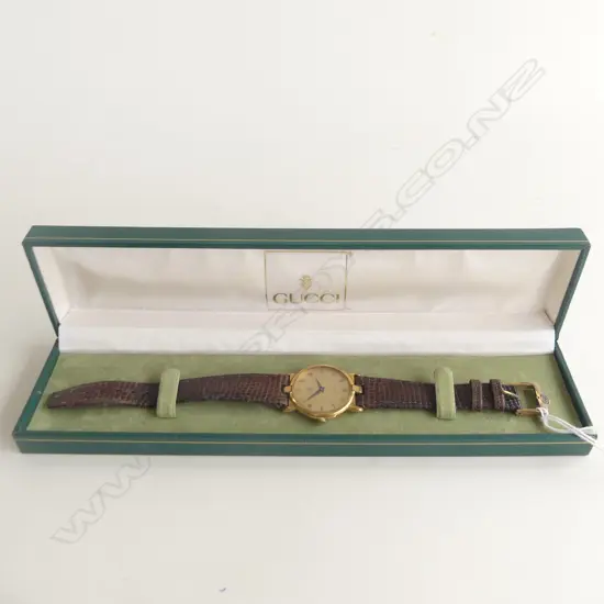 GUCCI WATCH, CASED - SHOWING WEAR