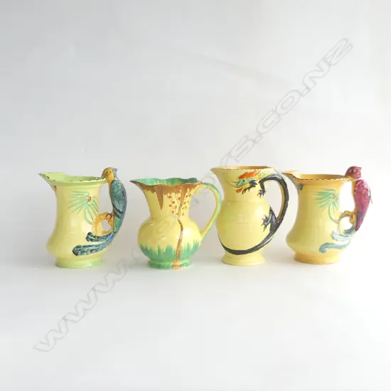 3 BURLEIGH WARE JUGS, 2 WITH BIRD HANDLES, 1 WITH DRAGON HANDLE  (H 200MM)  + 1 OTHER UNMARKED JUG H 175MM)