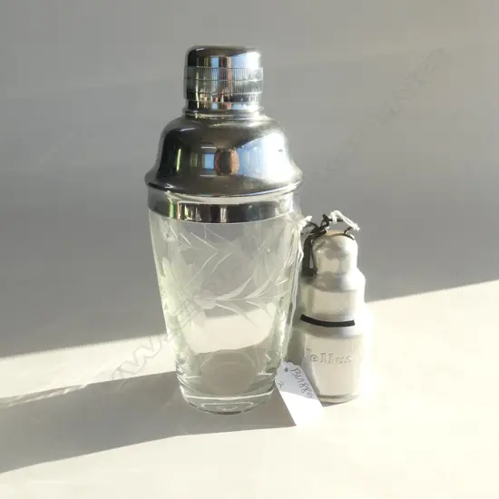 2 ITEMS. CHROME TOPPED GLASS COCKTAIL SHAKER H210mm & TELLUS VACUUM CLEANER PROMOTIONAL MONEY BOX  H.110MM 