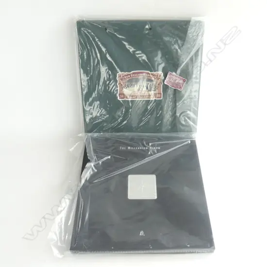 2 COLLECTABLE STAMP ALBUMS; 1 NZ HERITAGE 150 YEAR COLLECTION (1840 - 1990) & NZ MILLENIUM ALBUM. BOTH IN MINT CONDITION