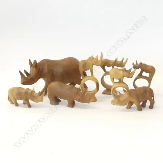 8 ASST CARVED WOODEN RHINO;S INCL 3 NAPKIN RINGS 