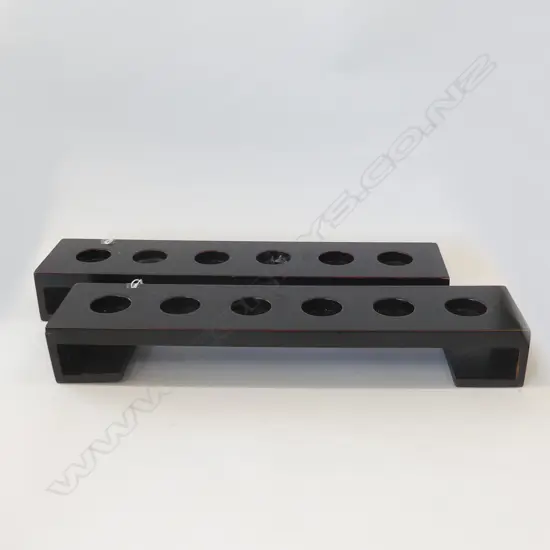 TWO JAPANESE WOODEN TABLE TEA-LIGHT HOLDERS