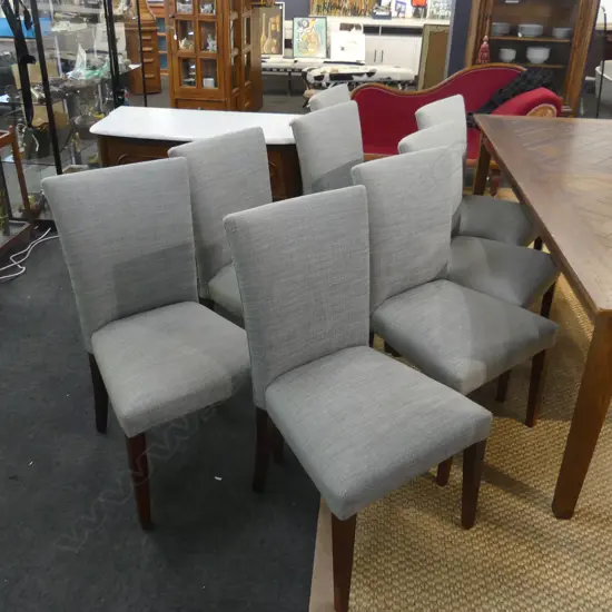 EIGHT HIGH BACK UPHOLSTERED DINING CHAIRS