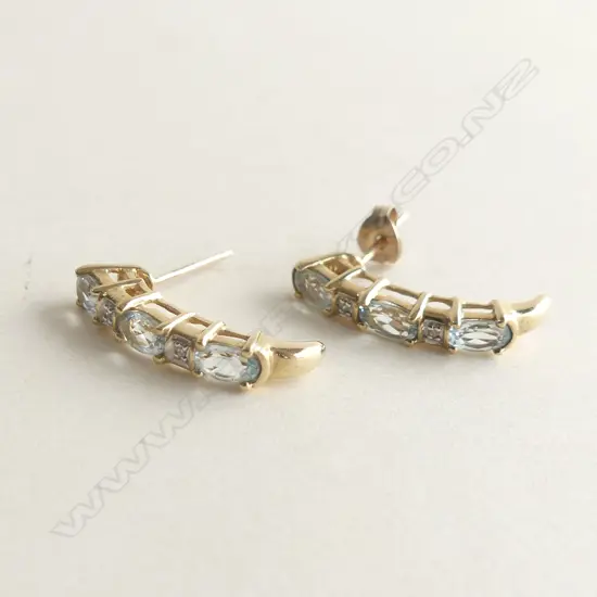 10CT YELLOW GOLD DROP STUD EARRINGS WITH LIGHT BLUE STONES; 2.8GMS