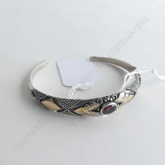 STG SILVER, 9CT GOLD AND GARNET CUFF BRACELET  25GMS