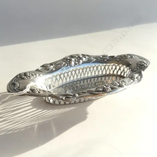 STG SILVER OVAL DISH, EMBOSSED RIM OF FLOWERS & PIERCED SIDES  63GMS