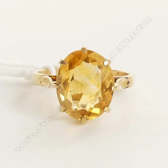 9CT GOLD LGE OVAL FACET CUT CITRINE RING 3.4gms