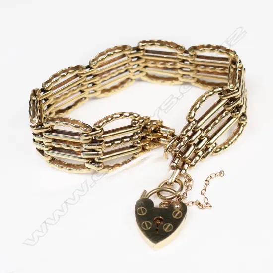 9CT GOLD TWISTED LINK GATE BRACELET 20.8gm