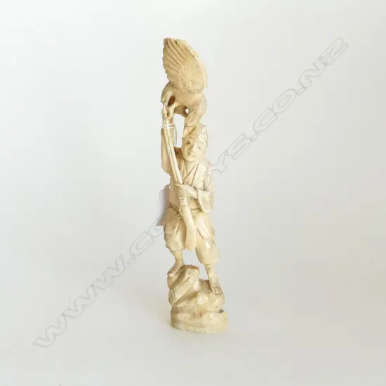 JAPANESE CARVED IVORY FIGURE (faults)