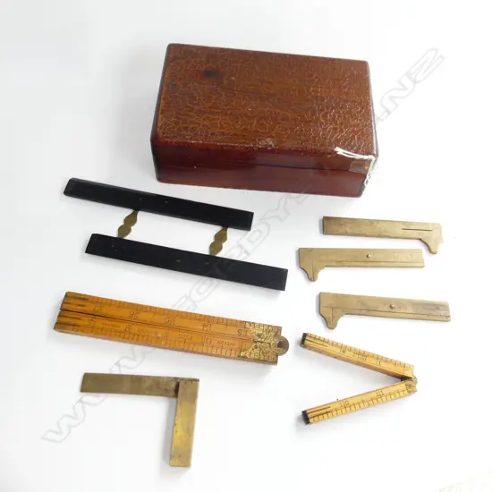 ANTIQUE TOOLS; 3 RABONE BRASS CALIPERS, SET SQUARE, 2 FOLDING RULERS, EBONY PARALLEL RULE, ALL IN WOODEN BOX W.175mm