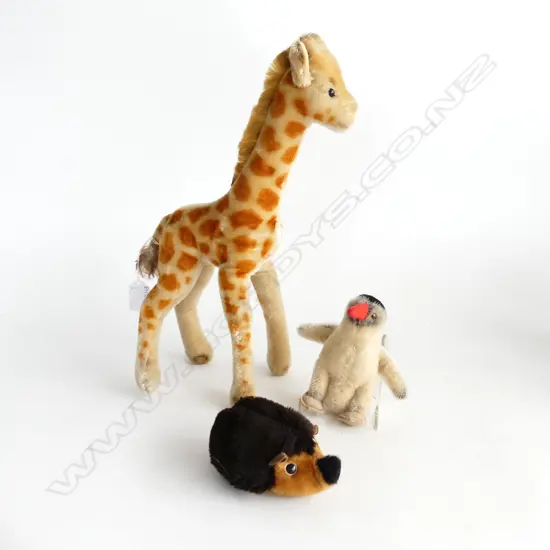 3 GERMAN 'STIEFF' SOFT TOYS; PENGUIN, HEDGEHOG, GIRAFFE H.350mm