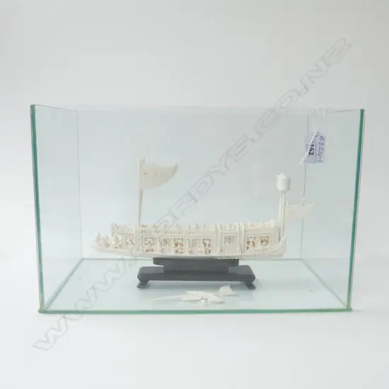 CARVED IVORY CHINESE FANCY JUNK BOAT w elaborate detail of figures balustrades sails etc L.280mm. On stand in glass case