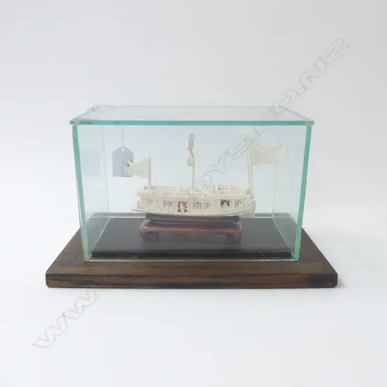 CARVED IVORY CHINESE FANCY JUNK BOAT w elaborate detail of figures balustrades sails etc L.150mm. On stand in glass case