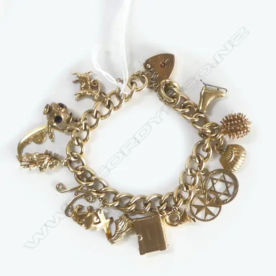 9ct YELLOW GOLD HEAVY CHARM BRACELET 44.5gms