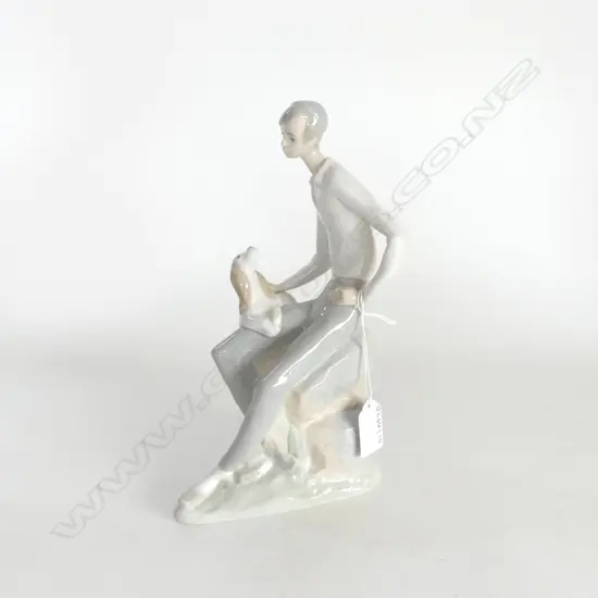 NAO FIGURE BOY WITH PUPPY ON KNEE H250MM