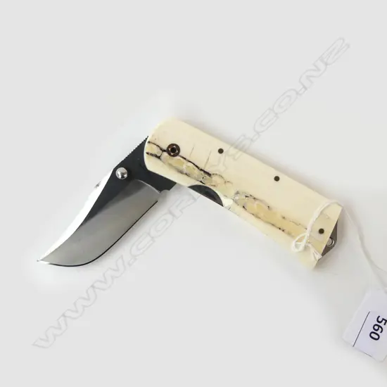 A COLLECTORS FOLDING KNIFE CARBON STEEL SIGNED IVORY HANDLE SHOWING CENTER NERVE SAKURA NAIL L100MM