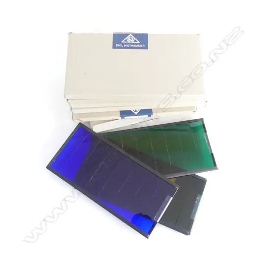 A BOX OF COULORED GLASS SHEETS EX STAGE LIGHTING L260MM