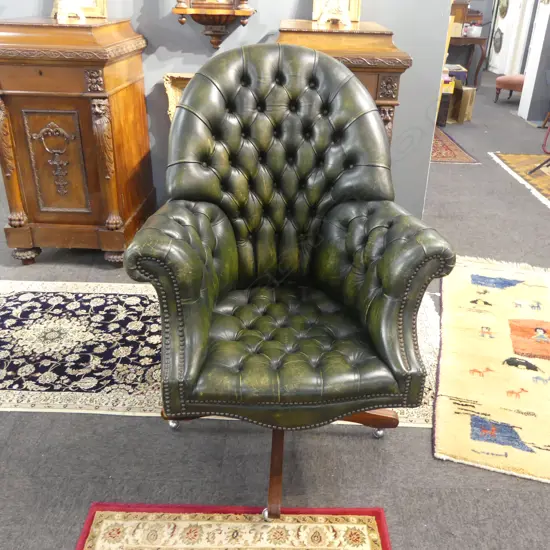 VINTAGE BUTTONED GREEN LEATHER SWIVEL CHAIR, DOERNER CANADA STICKER TO BASE  H.1120mm