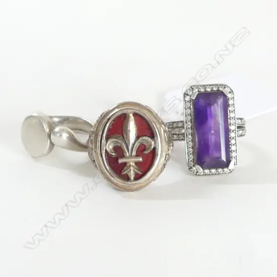 THREE COSTUME SILVER RINGS