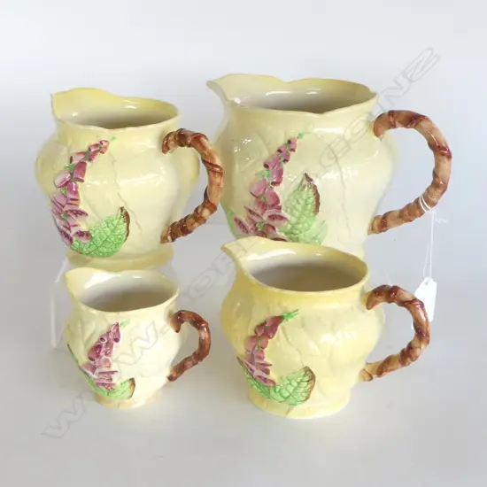 SET OF 4 GRADUATED YELLOW HOLLYHOCK PAT CARLTONWARE JUGS TALLEST120MM SMALLEST 70MM