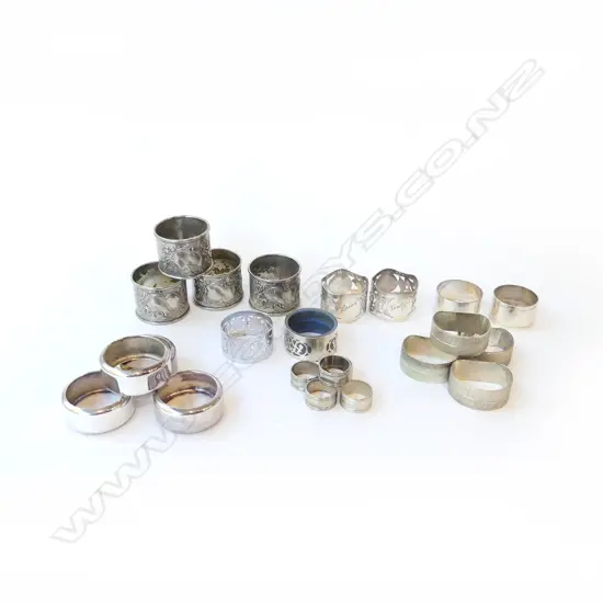 COLLECTION OF 23 VINTAGE SILVER PLATE NAPKIN RINGS