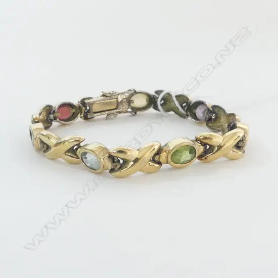 SILVER GILT BRACELET W 7 SEMI PRECIOUS FACETED OVAL STONES